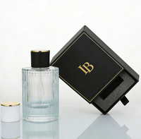 En stock, flacons de parfum en verre transparent côtelé de 30 ml, 50 ml, 100 ml, avec impression sur écran, boîtes d'emballage personnalisées