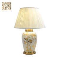 Lampe de table électrique en céramique européenne de luxe moderne avec abat-jour en forme de tambour pour la lecture dans la chambre
