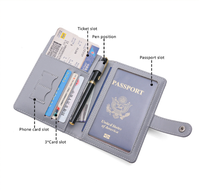 Porte-passeport vintage en cuir PU avec blocage RFID, fermeture à bouton et étui de protection, étui portable pour cartes et organiseur de documents