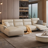 Ensemble de meubles de salon en cuir crème de luxe moderne, canapé 3 places, fauteuil, ottoman, table basse en marbre, salon, hôtel, commercial