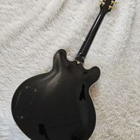 Guitare électrique noire de haute qualité avec corps en acajou, manche en érable, configuration de micros H-H, élégance et sophistication haut de gamme