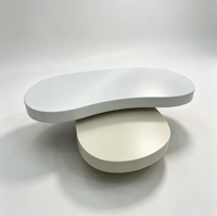 Table basse ronde pivotante moderne en crème, design minimaliste de luxe pour petit salon