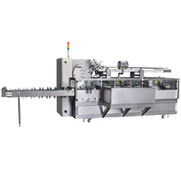 Machine d'emballage automatique à grande vitesse (80-120 cartons/min) à roulement pneumatique pour l'emballage de vêtements et de produits chimiques