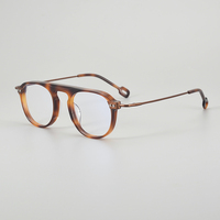 Cadre rond femme acétate + titane montures optiques en gros main anti-lumière bleue cadres logo personnalisé