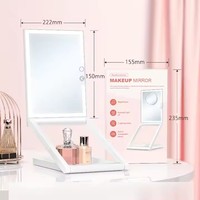 Miroir cosmétique de bureau pliable blanc avec finition bronze, éclairage LED à trois couleurs, gradation progressive et miroir grossissant 10x