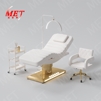 Mobilier moderne pour salon de beauté Lit de spa en cuir rose 3 moteurs Lit de massage électrique à base dorée avec tabouret et chariot