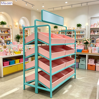 Vitrine d'exposition centrale lumineuse à LED à 3 niveaux, robuste et écologique, en forme de nœud, pour magasin de jouets, idéale pour les cadeaux et jouets tendance