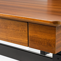 Bureau debout en L moderne personnalisé OEM/ODM avec rehausseur, table d'ordinateur portable réglable pour le bureau à domicile