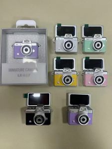 Mini caméra numérique HD 1080P CMOS la mieux notée avec écran rotatif à 180° pour selfie, compatible MicroSD, idéale pour Vlog, format compact en forme <span class=keywords><strong>de</strong></span> bouton, avec fonction porte-clés - Product Image 1