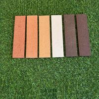 Briques d'argile de tuile de façade en terre cuite de qualité supérieure 60x240x11mm avec fonctionnalité de brique réfractaire à surface rugueuse pour murs extérieurs