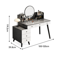 Table de toilette blanche avec miroir rond, grands tiroirs de rangement et étagères ouvertes