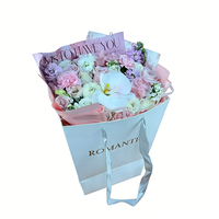 Sac cadeau personnalisé en papier couché trapézoïdal carré blanc avec logo imprimé argent chaud pour fleurs