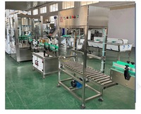 Machine de remplissage d'eau électrique pour fûts de 3 et 5 gallons, intégrée à la machine de mise en conserve et de bouchage pour eau purifiée en fûts