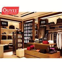 Aménagement intérieur de magasins de vêtements pour hommes haut de gamme, présentoirs en bois pour boutiques de costumes