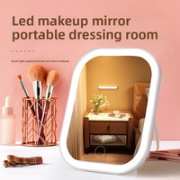 Petit miroir de maquillage portable pour filles, cadre en métal durable, support avec lumière LED tactile, design transfrontalier, utilisation sur le bureau