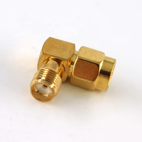 Adaptador de conector coaxial RF de ángulo recto DC-12.40GHz SMA macho a SMA hembra
