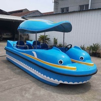 Nouveau design de bateau électrique dauphin en fibre de verre auto-drainant pour 4 personnes pour l'amusement familial et les jeux d'eau Matériau en acier durable