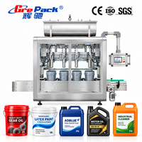 Machine d'automatisation de pesage et de remplissage d'huile lubrifiante liquide en fûts en plastique