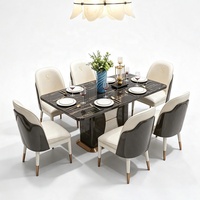 Ensemble de table à manger en marbre noir de luxe avec six chaises en cuir crème pour villa, restaurant, mobilier, solution complète pour toute la maison