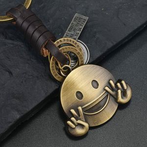 Llavero de metal retro para bicicleta con colgante de aleación de bronce con cara sonriente y estrella hexagonal, de cuero trenzado, regalo creativo, venta al por mayor - Product Image 3