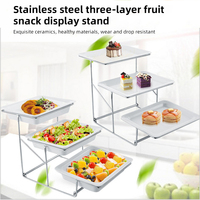 Présentoir alimentaire en plastique multi-niveaux pour traiteur, buffet et desserts, idéal pour les événements
