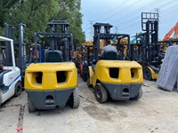 Chariot élévateur électrique d'occasion KOMATSU 5 tonnes à quatre roues motrices, moteur ISUZU, 3 montants, vidéo de test et inspection, Shanghai, garantie 3 mois