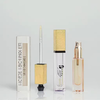 Tube de gloss cosmétique vide transparent carré avec bouchon doré et bordure noire, personnalisable avec logo, avec applicateur à baguette