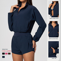 Veste de sport courte à col montant et fermeture éclair pour femme