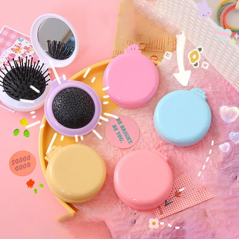 Custom logo solid color mini folding comb pocket hair brush travel round pop up air cushion comb with mirror