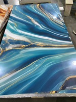 Conception de luxe 3mm 4mm Grain de pierre en plastique revêtement UV panneau mural en pvc panneau PVC feuille de marbre pour la décoration de la maison