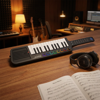 Midiplus Band Çok Fonksiyonlu Keytar 25 Tuşlu Hız Duyarlı MIDI Klavye Tek Kişilik Grup Performansı için Dahili Hoparlör