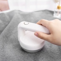 Tragbarer elektrischer Fusselentferner und Stoffrasierer, wiederaufladbar mit elektronischem Akku