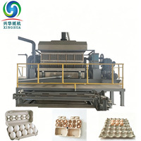 Ligne de production automatique de barquettes à œufs en pâte à papier, capacité 7000 pièces/heure, tension personnalisée, 40000 kg
