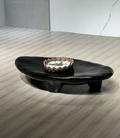 Table basse ovale en pierre de pavé minimaliste italienne, en panneau haute densité, noire, minimaliste, salon, petite unité, table à thé