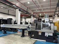 Tour CNC suisse à double broche Fanuc ST-203, machine combinée de tournage et de fraisage pour métaux avec alimentateur automatique de barres