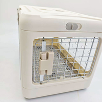 Cage de transport pliable pour animaux de compagnie à quatre roues avec fermeture à bouton, en plastique, respirante toutes saisons, pour sorties, commande en gros usine
