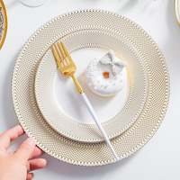 Vaisselle de luxe en céramique à bord doré, design moderne et tendance, pour la vente en gros, vaisselle jetable pour fêtes