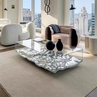 Table basse en verre ultra-blanc de style artistique moderne avec design en acrylique à ondulation d'eau Mathieulehanneur pour meubles de salon et de maison