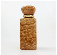 Flacon de parfum rectangulaire en verre coloré haut de gamme de 50 ml avec impression par transfert d'eau, bouchon à vis et diffuseur à roseaux
