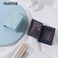 Boîte d'emballage de bijoux en cuir PU en forme de livre, style personnalisé Huayue, pour boucles d'oreilles et colliers