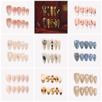 Ongles à presser en acrylique rose nude, motif coquillage de sirène, amande, avec feuille de coquillage 3D, feuille d'or, étoile de mer, fleur blanche et paillettes de perles