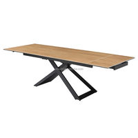 Table de salle à manger à deux fonctions d'extension à usage domestique en céramique et fond en verre comme pied de table supérieur est une plaque de métal noire