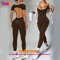 Body sculptant pour femme à manches courtes, décolleté plongeant en V, dos nu avec lignes contrastées, effet push-up fessier, extensible dans les 4 sens, fabrication directe usine, marque privée OEM