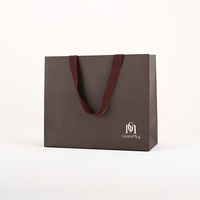 Sac d'emballage pour vêtements de vente au détail GLAMPKG, recyclable, respectueux de l'environnement, en papier texturé enduit avec poignée en ruban