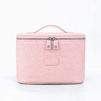 Vente en gros d'usine, étui de toilette en cuir portable pour femmes, grand format, avec logo personnalisé, étui cosmétique en cuir PU imperméable avec poignée