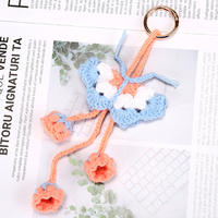 Crochet fait à la main Lily Valley voiture miroir suspendu décor tissé papillon fleur de lys tricoté porte-clés jouets en peluche papillon porte-clés