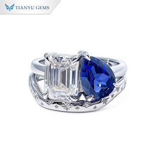 แหวน TIANYU GEMS แบบสั่งทำพิเศษ Toi Et Moi ประดับเพชรทรง Emerald Cut และไพลินสีน้ำเงินทรงหยดน้ำ พร้อมสลักลายรูปดาว ดีไซน์แบบแยกแหวน สำหรับผู้หญิง สวมใส่เป็นแหวนหมั้น - Product Image 1