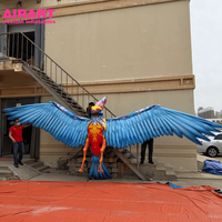 Ballon phénix de 6,5 m de large de style technologique pour la décoration de fond de scène, animaux gonflables personnalisés en forme d'oiseau phénix volant pour la musique