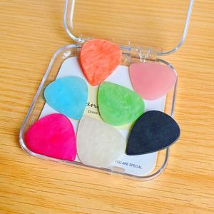 ใหม่ 20 มม. ปิ๊กกีตาร์อเนกประสงค์เคลือบด้านกันลื่นสีสันสดใสสำหรับเล่นกีตาร์ไฟฟ้าเบส - Product Image 4