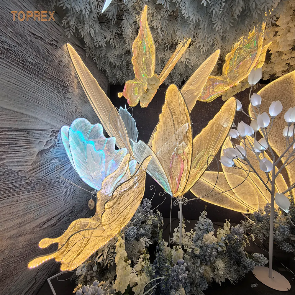 Toprexサイズはカスタマイズすることができますエレガントな結婚式のエンチャント見事な動くLed蝶の装飾